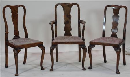 Appraisal: A George II style walnut carver and side chair each