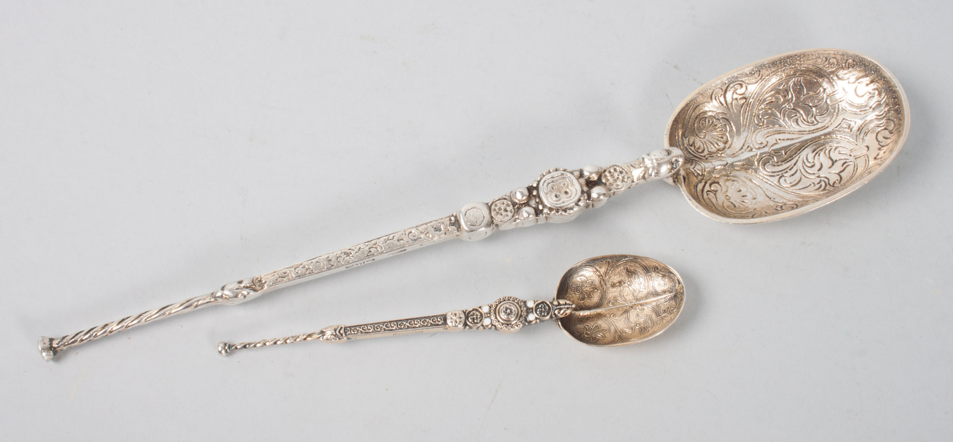 Appraisal: English sterling silver anointing spoons Charles George Asprey London together