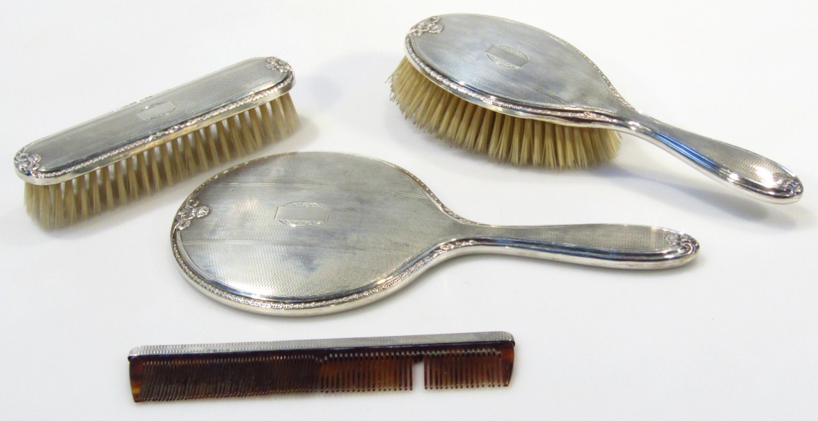 Appraisal: A matched four piece dressing table set comprising hairbrush cm