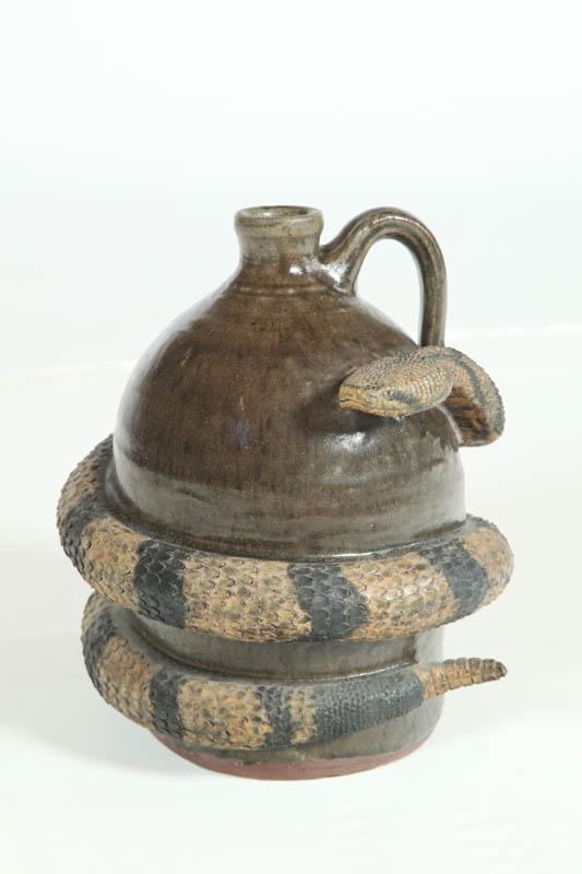 Appraisal: GROTESQUE JUG Georgia th century redware Signed Michael Crocker Melvin