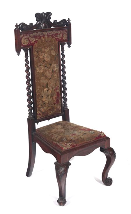 Appraisal: A Victorian simulated rosewood prie dieu chair the scroll carved