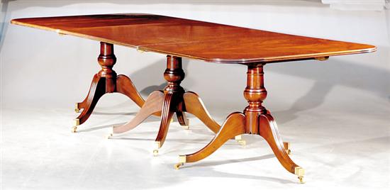 Appraisal: Georgian style mahogany triple pedestal banquet table rectangular top with