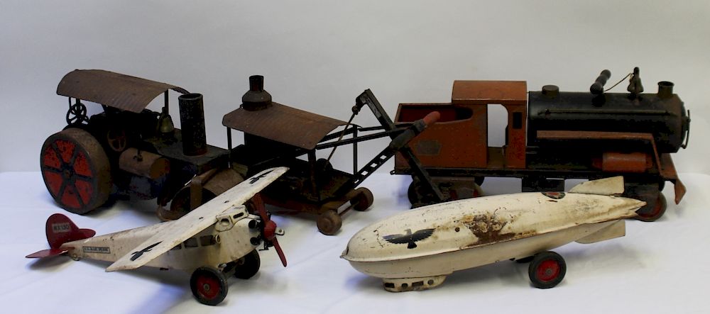 Appraisal: Lot of Antique Metal Toys To include sit on a