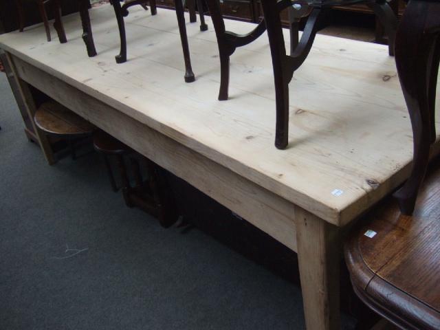 Appraisal: A th century pine kitchen table the triple plank top