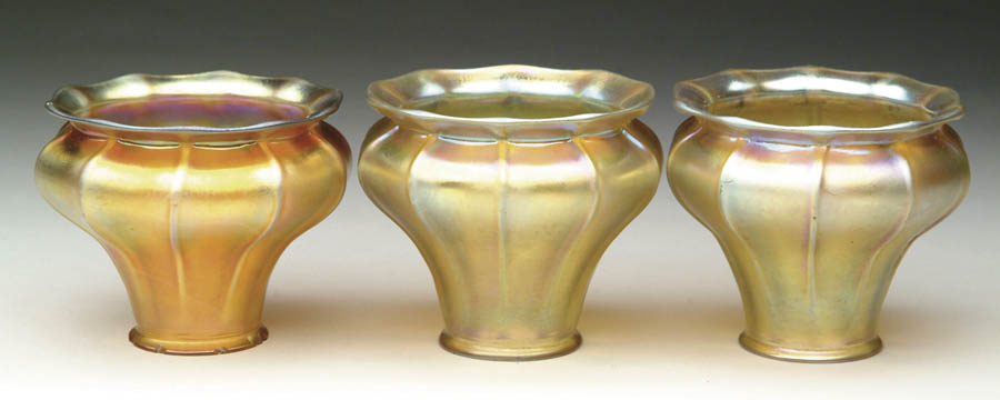 Appraisal: THREE STEUBEN ART GLASS SHADES Nicely ribbed shades of gold