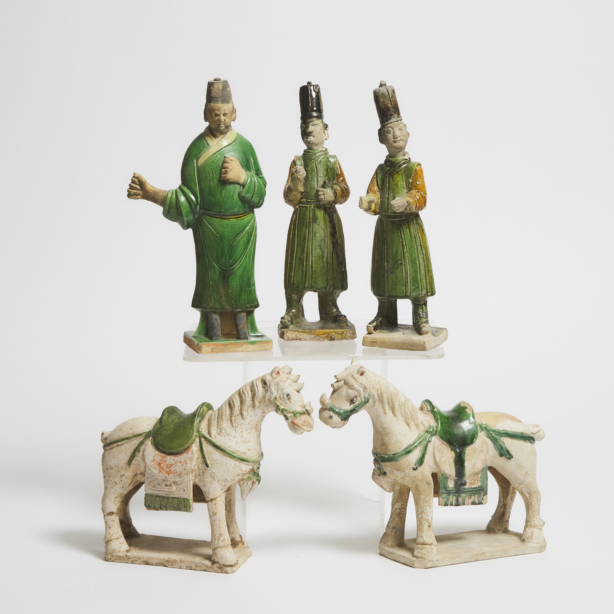 Appraisal: A Group of Five Sancai-Glazed Pottery Horses and Attendants Ming