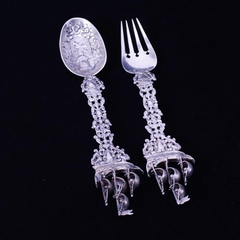 Appraisal: Antique Dutch fork and spoon with figural dimensional sailing ship