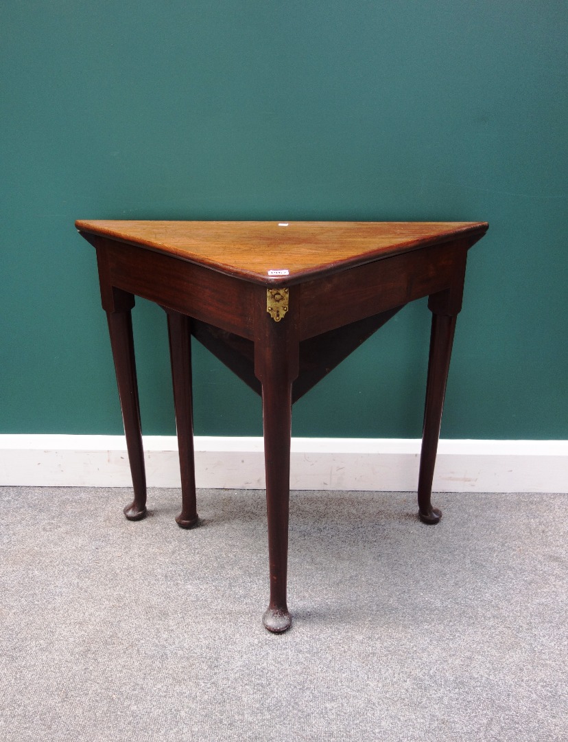 Appraisal: A mid th century mahogany handkerchief drop flap corner table