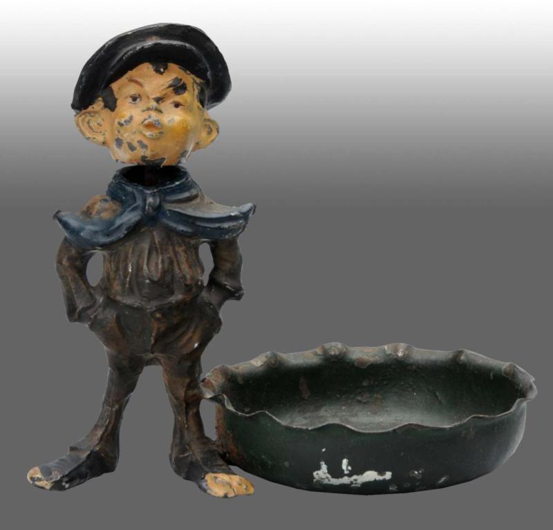 Appraisal: Whistling Boy Nodding Head Ashtray Description Lead metal Condition Excellent