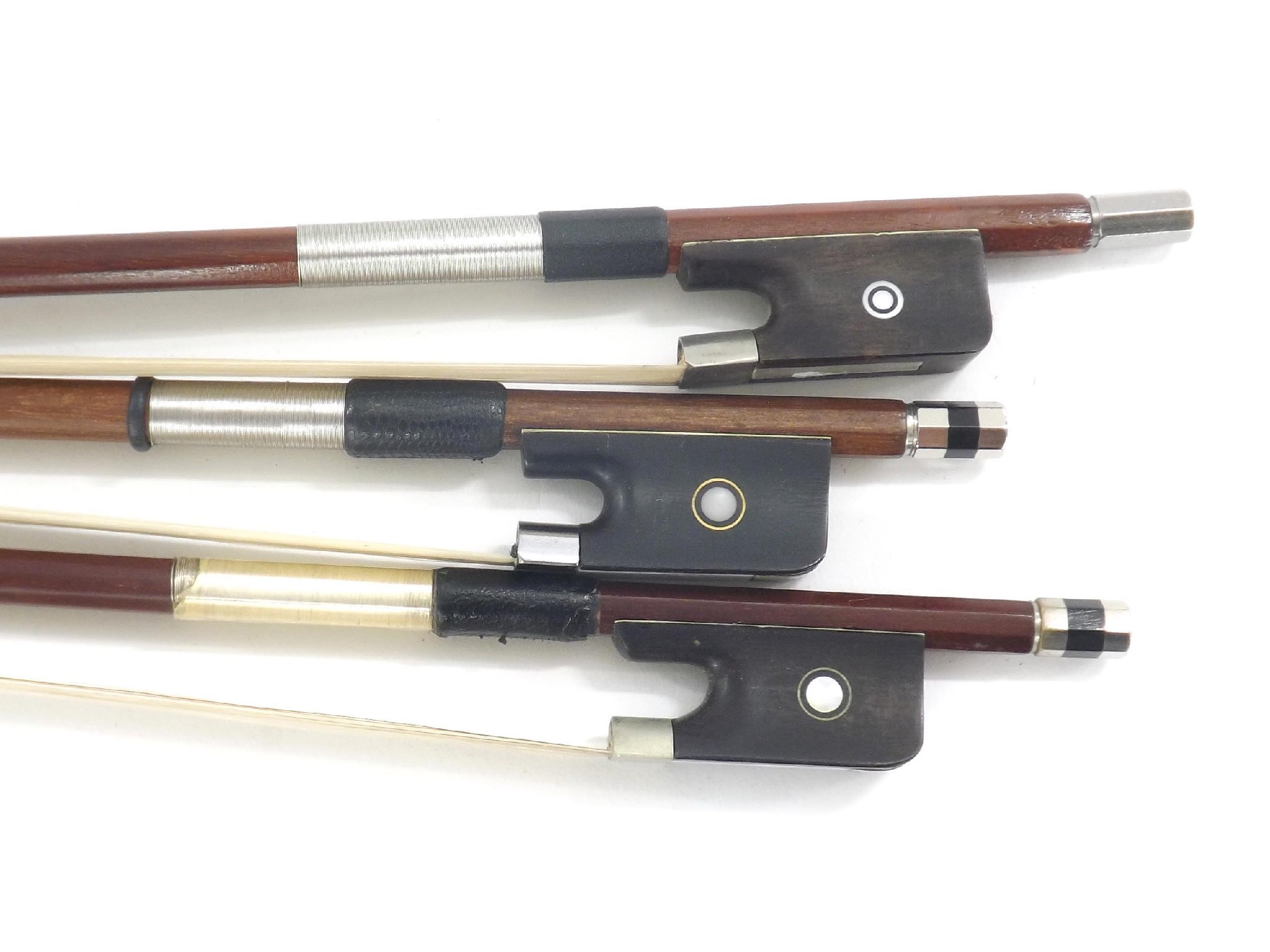 Appraisal: Three nickel mounted violoncello bows