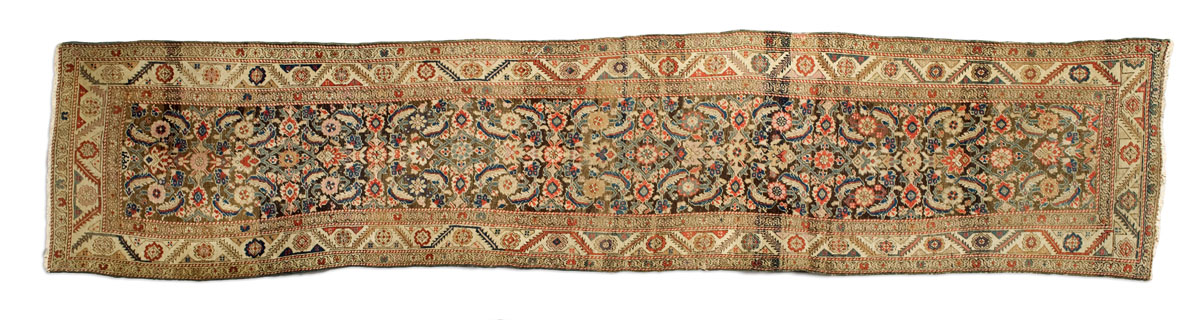 Appraisal: NORTHWEST PERSIAN RUNNER LATE TH CENTURY The abrashed brown field