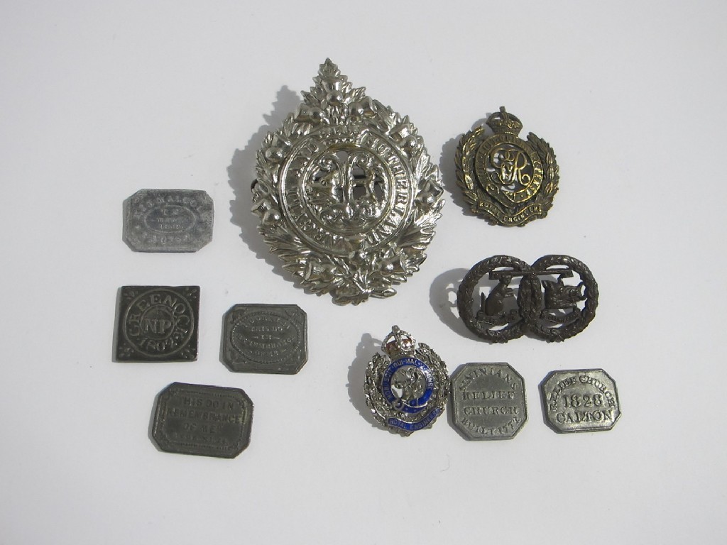 Appraisal: A lot comprising a sweetheart brooch three military badges and