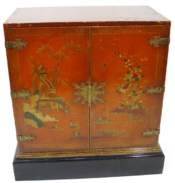 Appraisal: Scarlet lacquer two door cabinet decorated in the chinoiserie manner