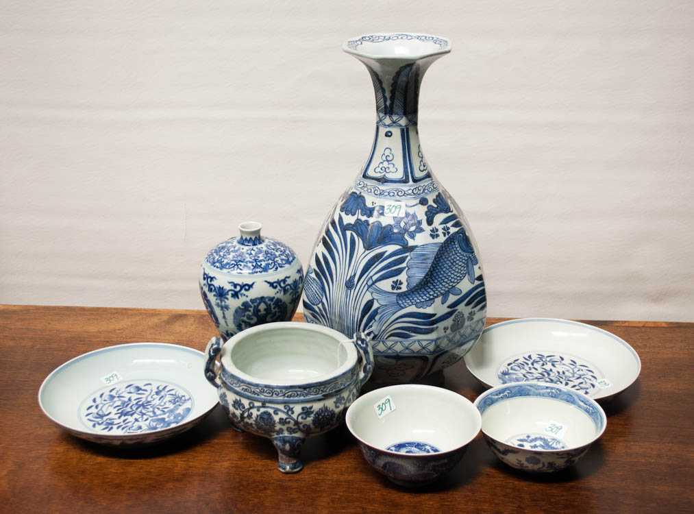 Appraisal: SEVEN BLUE AND WHITE CHINESE PORCELAIN VESSELS octagonal pear form