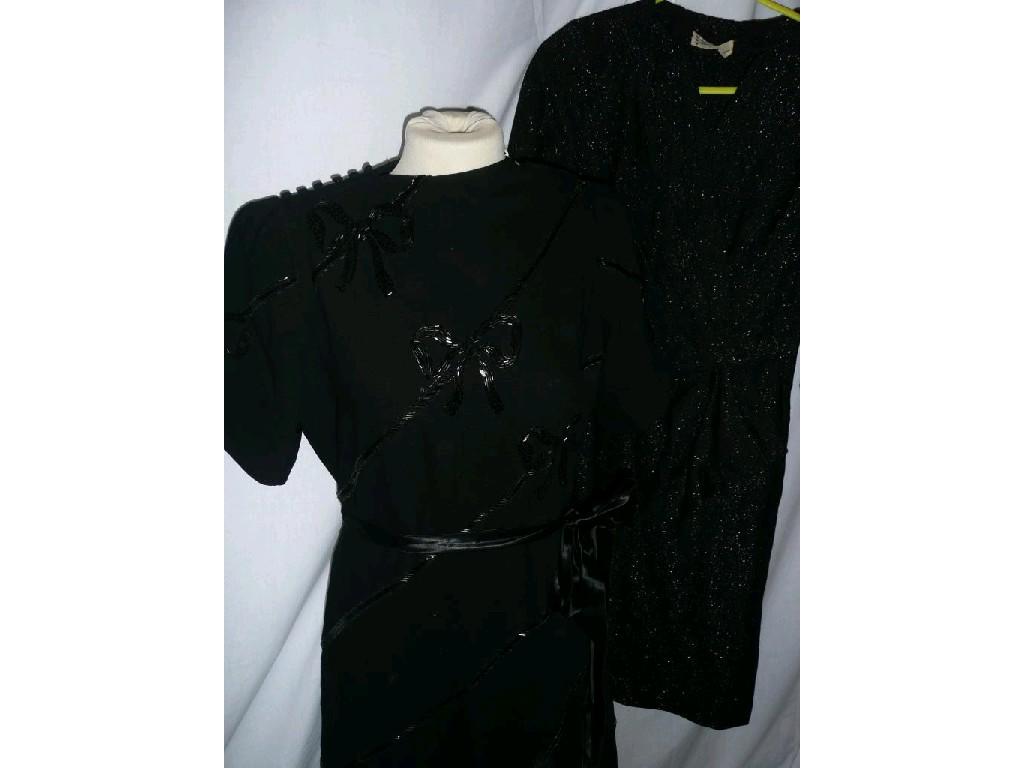 Appraisal: A bust vintage cocktail dress in black with diagonal beading