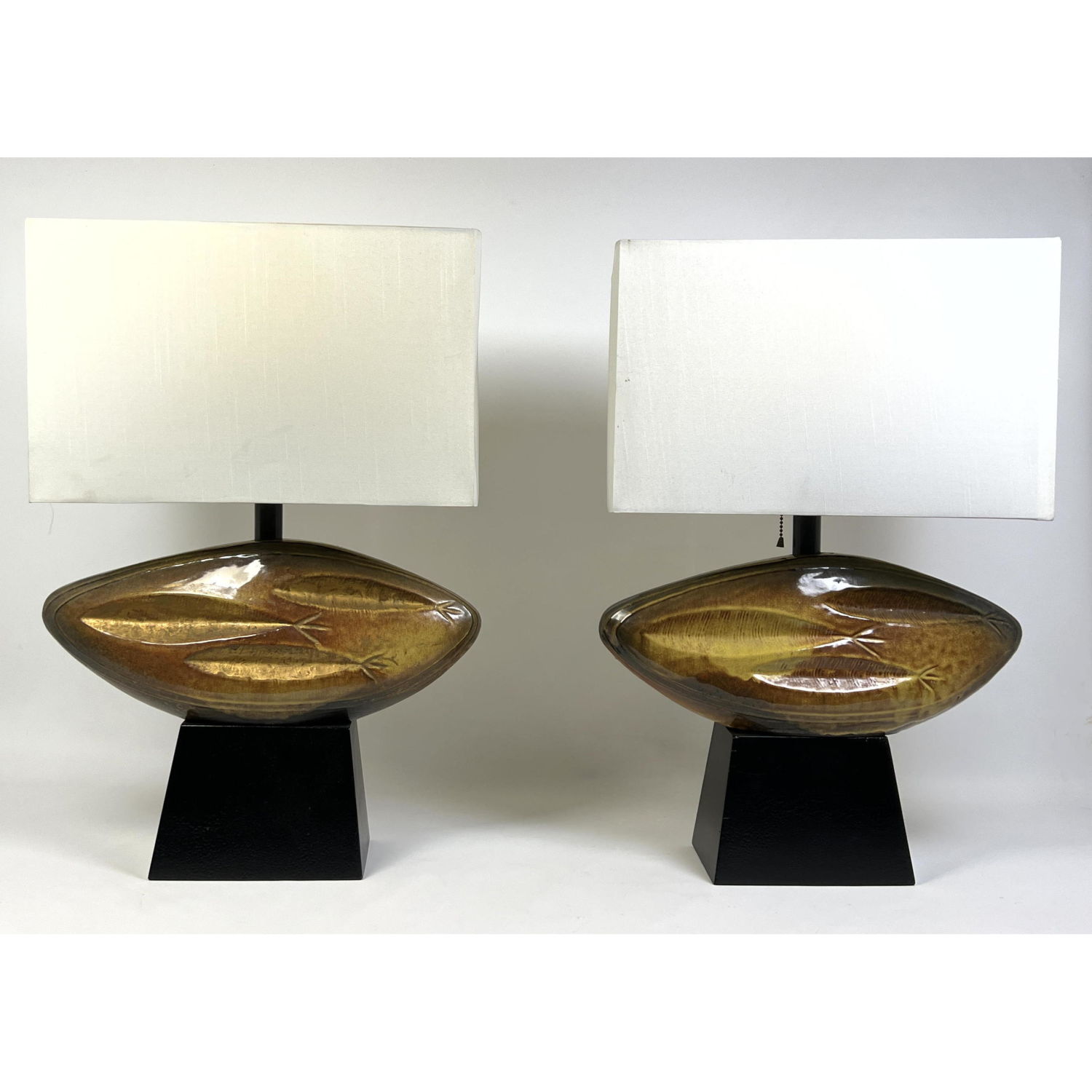 Appraisal: In the style HEIFETZ lamp company Pair of ceramic fish