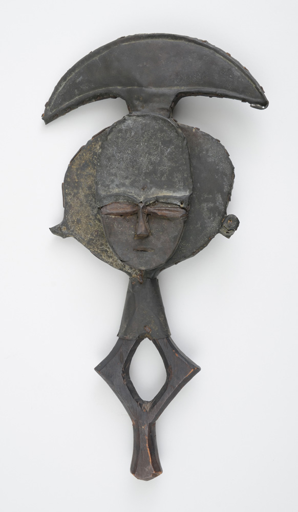 Appraisal: Kota Copper-Clad Figural Staff The flattened oval face on horizontal