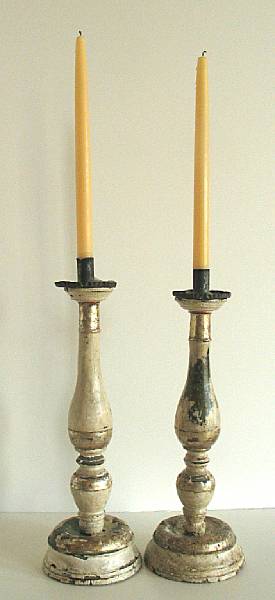 Appraisal: Two Italian silvered wood candlesticks th century Each disk baluster