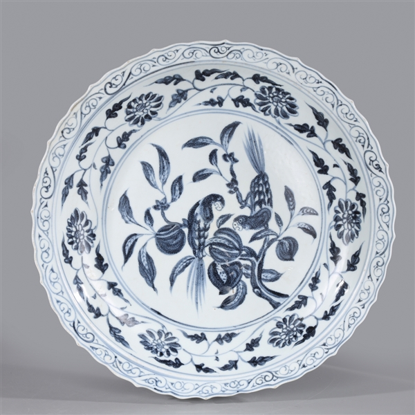 Appraisal: Large Chinese blue and white porcelain charger with parrot and