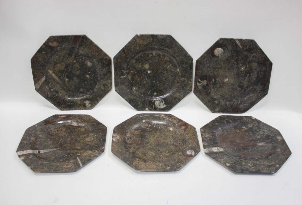 Appraisal: SET OF SIX CARVED FOSSIL SERVICE PLATES hardstone octagonal with