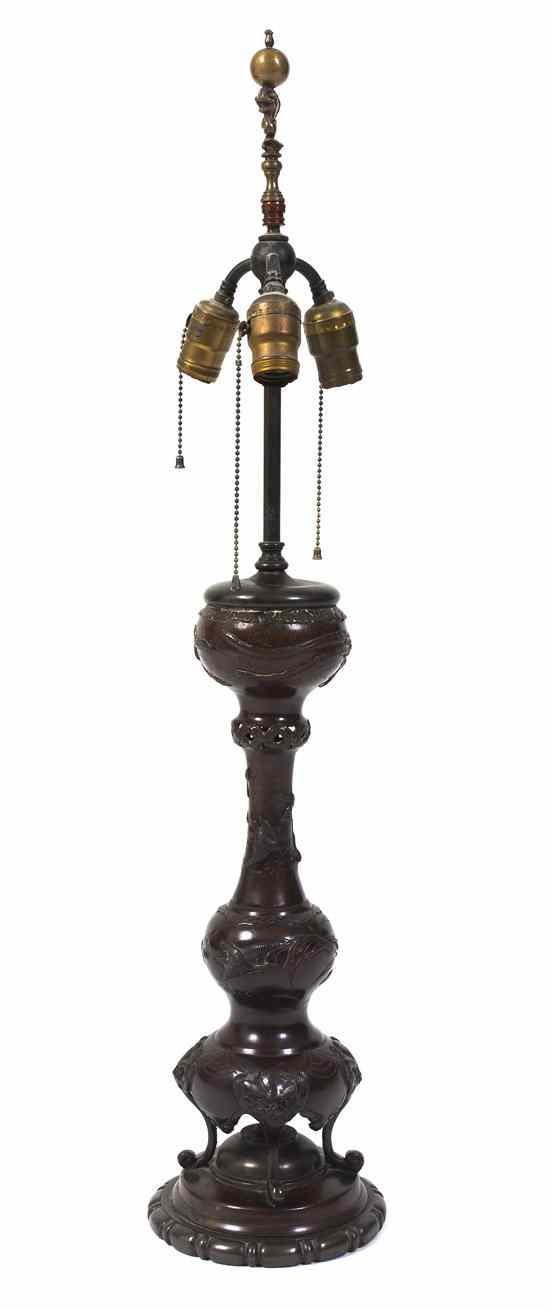 Appraisal: A Japanese Bronzed Metal Lamp of repeating baluster form decorated