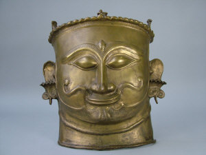 Appraisal: A cast bronze mask depicting Siva cm high x cm