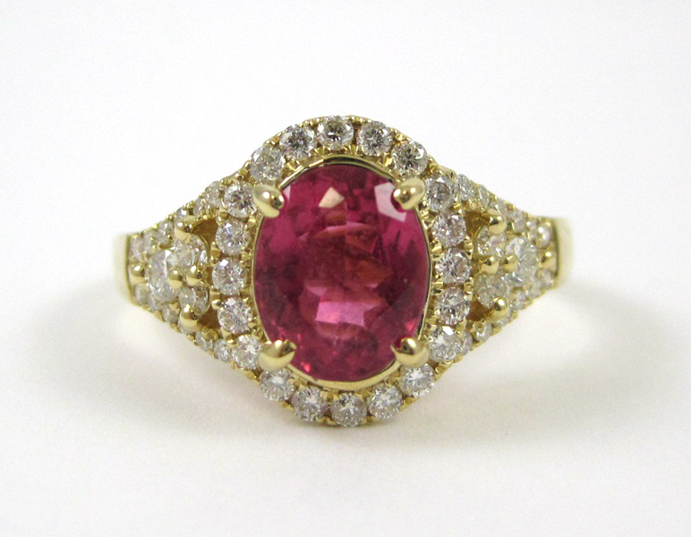 Appraisal: FOURTEEN KARAT GOLD PINK TOURMALINE AND DIAMOND RING the approximately