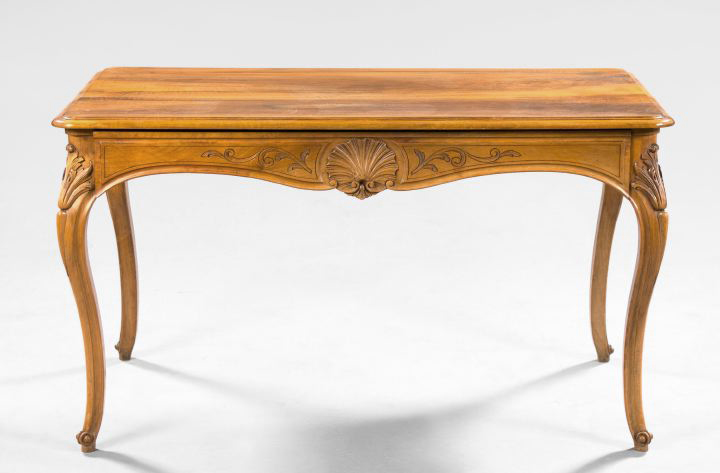 Appraisal: Provincial Louis XV-Style Fruitwood Writing Table the rounded rectangular top