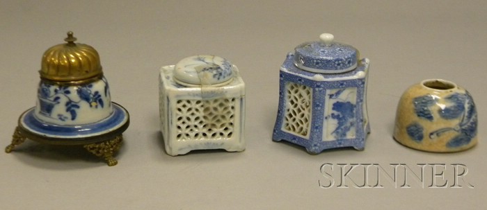 Appraisal: Four Chinese and Japanese Blue and White Decorated Porcelain Inkwells