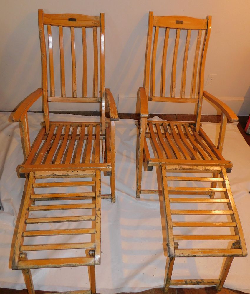 Appraisal: QUEEN ELIZABETH DECK CHAIRS Pair of authentic ships deck lounge