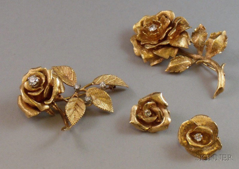 Appraisal: Two Similar kt Gold and Diamond Accented Floriform Brooches and