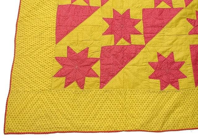 Appraisal: Quilt with red star forms and triangles overall and yellow