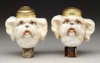 Appraisal: PAIR OF FIGURAL DOG HEAD PEG LAMP FONTS H -