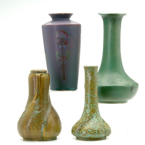 Appraisal: CHICAGO CRUCIBLE Four vases two in mottled green glaze reglued