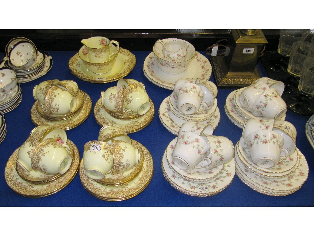 Appraisal: Lot comprising two Crown Staffordshire twelve setting teasets