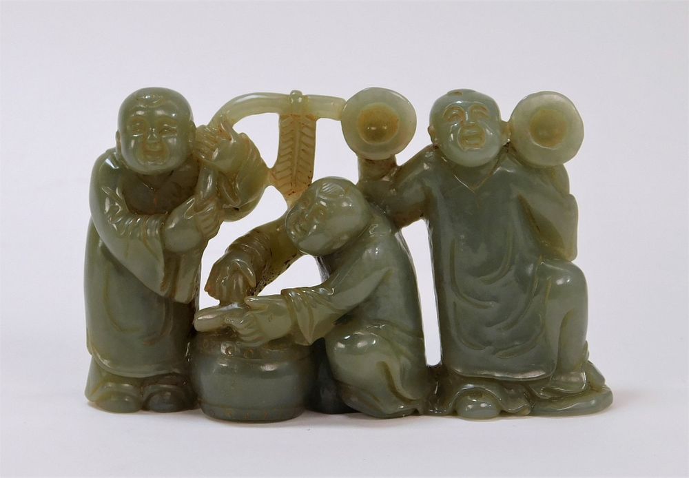 Appraisal: Chinese Hardstone Celadon Carving of Figures China th century Depicting