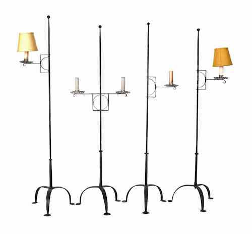 Appraisal: Four th c style wrought iron electric floor lamps