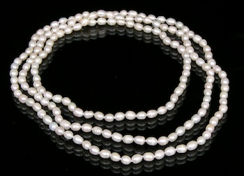 Appraisal: A Inch Strand of Oval Freshwater Pearls A hand-knotted strand