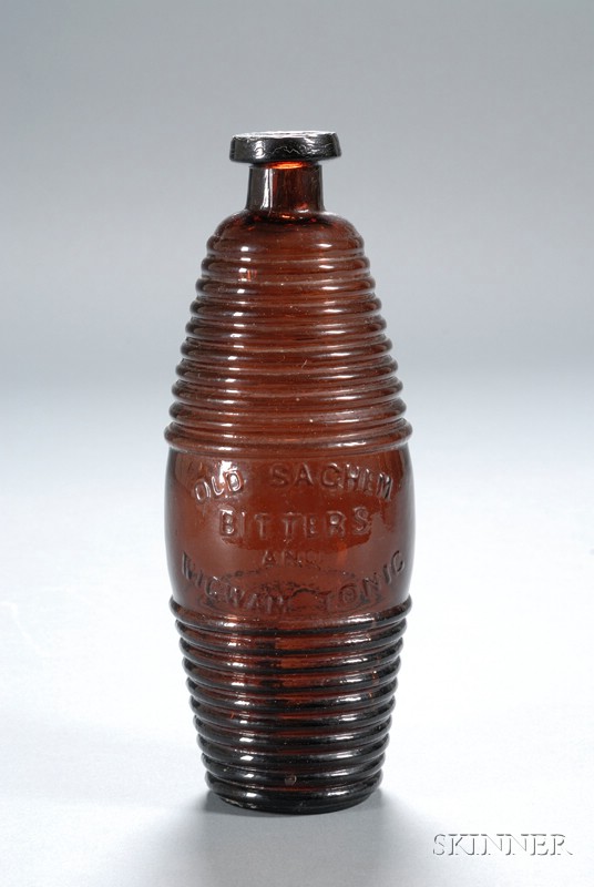 Appraisal: Old Sachem Puce Glass Bitters Bottle America - ringed barrel