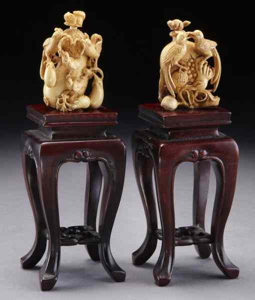 Appraisal: Pr Carved ivory snuff bottles International buyers should note that