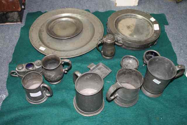 Appraisal: A PEWTER CHARGER diameter together with further pewter items including