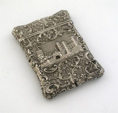 Appraisal: A Victorian embossed 'castletop' card case double sided with a