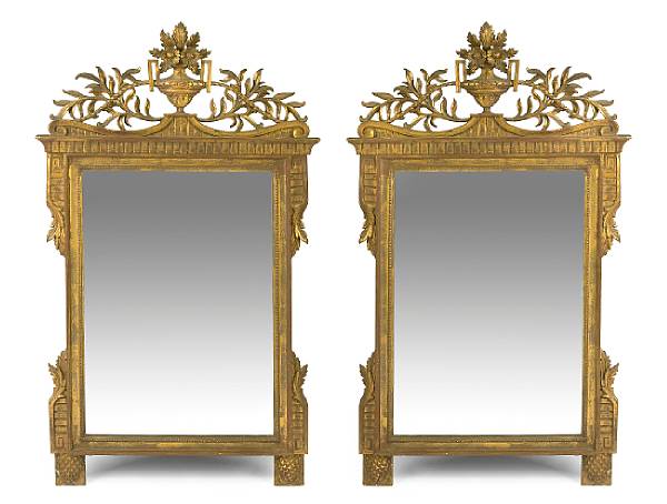 Appraisal: A pair of R gence style carved giltwood mirrors th