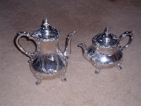 Appraisal: A Victorian silver teapot and coffee pot George Reilly London