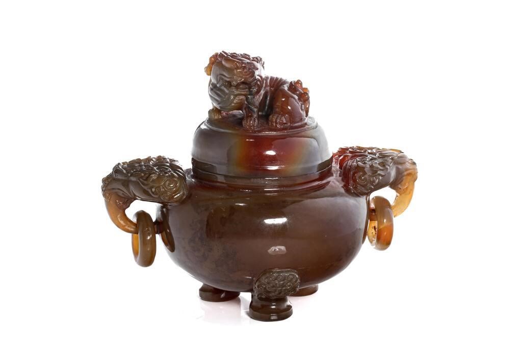 Appraisal: Chinese a covered tripod censer carved from agate with a