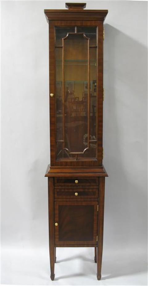 Appraisal: MAITLAND-SMITH MAHOGANY DISPLAY CABINET The pagoda inspired top over single