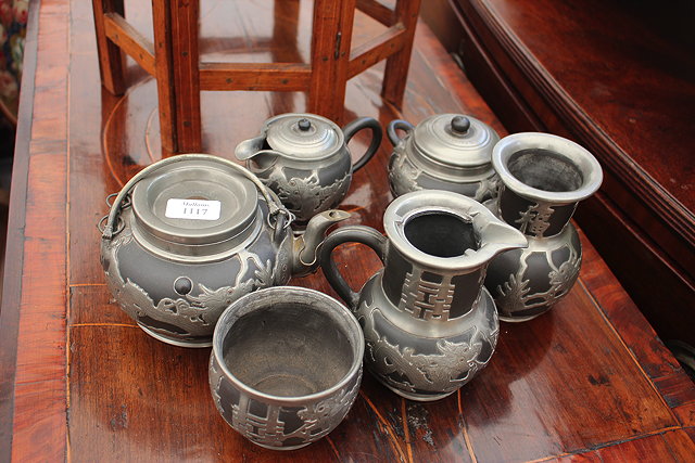 Appraisal: A BLACK STONEWARE AND PEWTER MOUNTED SIX PIECE CHINESE TEA