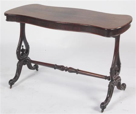 Appraisal: An early Victorian rosewood library table the top of serpentine