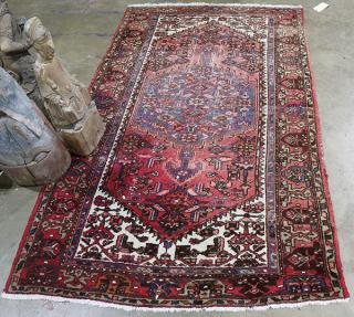 Appraisal: Persian Heriz Rug wear ' x ' Persian Heriz carpet