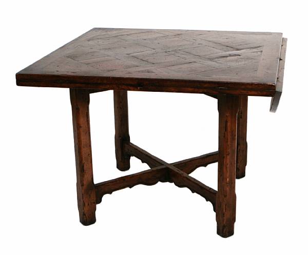 Appraisal: A Provincial style stained oak drop-leaf circular dining table height